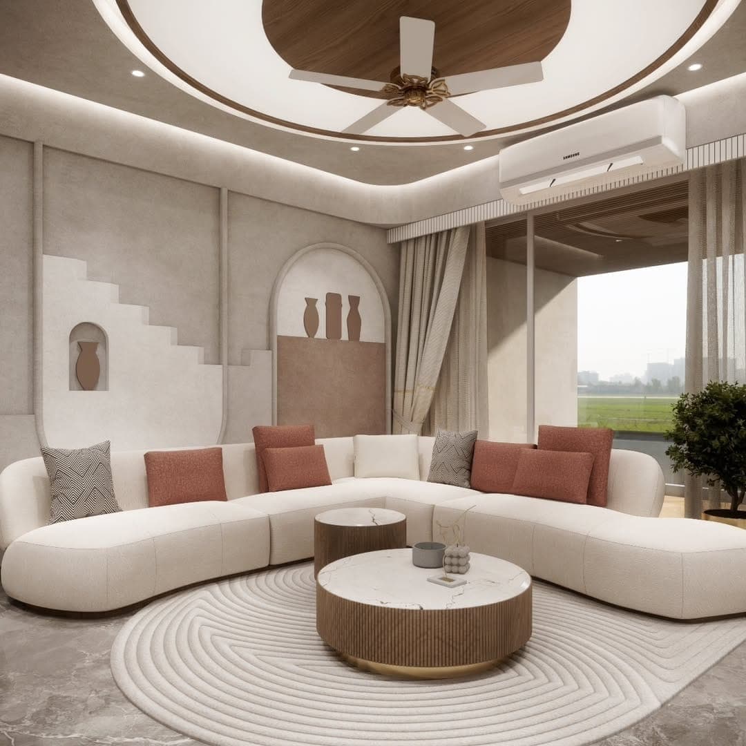Living room with a curved cream sectional, coral cushions and a circular false ceiling
