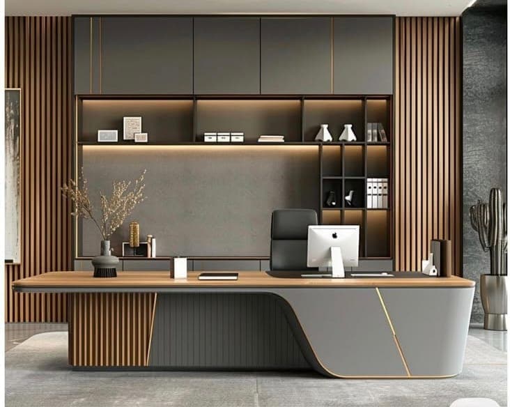 Executive office cabin with a curved desk, fluted wall panelling and backlit display shelving